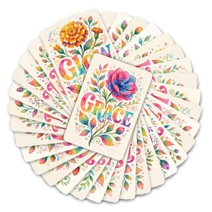 Nahaufnahme bunter Grußkarten mit Aquarell-Blumenmustern und Grace-Schriftzug-Details