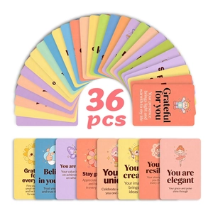 Macro detail of 36 macaron-colored motivational cards with cute cartoon illustrations