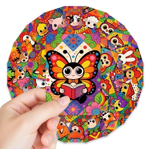 Hand holding a butterfly reading card from a set of 36 cute cartoon animal bookmarks