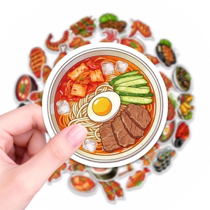 Dettaglio di un adesivo rotondo con spaghetti freddi per decorazione creativa di diari