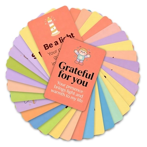 Macro view of 36 pastel positive affirmation cards with rounded corners and cute motifs