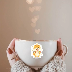 Détail d'un autocollant Shiba Inu mignon avec chapeau de fête sur une tasse