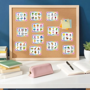 Detailed educational English word cards featuring cartoon animals and fruits on a cork board