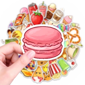 Close-up of cute waterproof food stickers featuring macarons, snacks and sweet desserts