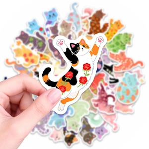 Detailed view of waterproof cartoon cat sticker featuring delicate red flower patterns