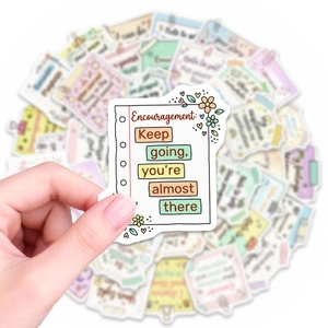 Close-up of waterproof encouragement sticker with floral design and motivational quote