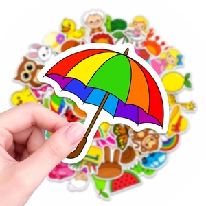 Detail showing a cute rainbow umbrella sticker held in hand with assorted animal decals