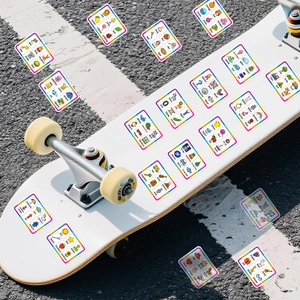 Outdoor view of children's English alphabet learning stickers on a white skateboard