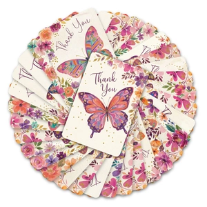 Macro view of floral butterfly thank you cards arranged in a decorative fan shape