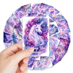 Detail of unicorn greeting cards featuring dreamy watercolor art and courage quotes