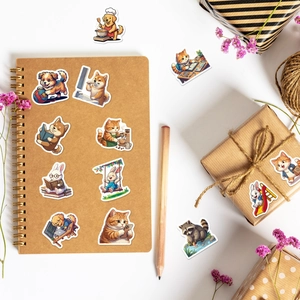 Cute animal stickers on notebook showing waterproof PVC decals for scrapbooking