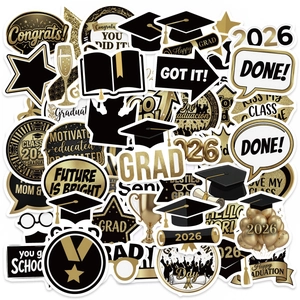 Detailed view of 2026 graduation party stickers with black and gold celebratory motifs