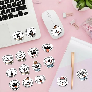 Detailed view of cute white puppy stickers with various expressions on a pink desk
