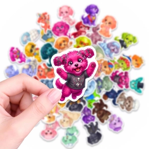 Close-up of a waterproof cartoon dog sticker with skull guitar shirt for DIY decoration