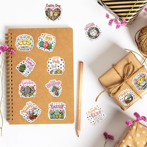 Close-up of Easter stickers applied to kraft paper notebook with rabbits and eggs