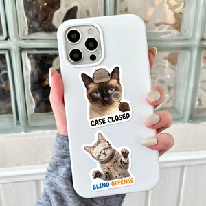 Detail of white iPhone case featuring detective cat illustrations and creative text prints