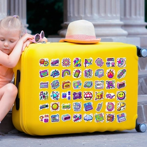 Retro pixel art stickers on a yellow suitcase with retro 8-bit game console elements