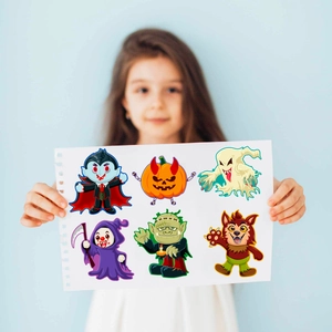 Dettaglio di 6 fogli di adesivi di Halloween con facce buffe per il puzzle dei bambini
