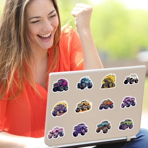 Cool monster truck stickers applied on laptop with happy woman in the background