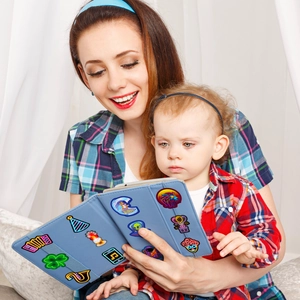 Blue tablet case with neon cartoon icons shown in a warm family living room setting