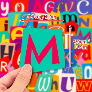 Handheld view of a 1.9-inch colorful alphabet sticker with a red M on green background