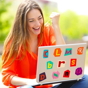 Colorful English letter stickers for laptop decoration shown in an outdoor lifestyle setting