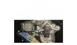 Macro view of laser holographic stickers showing sun and moon with waterproof droplets