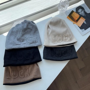Slouchy knit beanie hats for women with Luck patch in grey beige black and brown