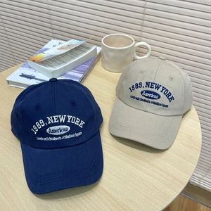 Retro New York 1989 embroidered baseball caps in navy blue and khaki cotton twill