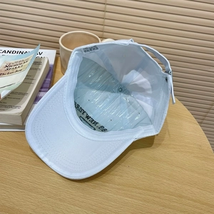 Detail view of cotton baseball cap interior with sweatband and adjustable metal buckle