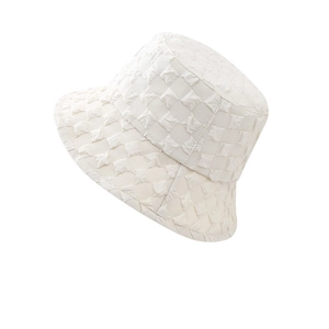 Minimalist bubble gauze bucket hat in off-white featuring a retro textured waffle pattern