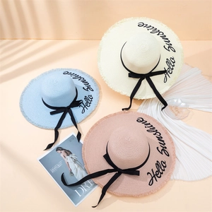 Straw sun hats with Hello Sunshine embroidery and bow ties for summer beach vacation