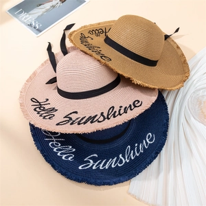 Wide brim straw sun hats with Hello Sunshine embroidery in beige, pink, and navy blue