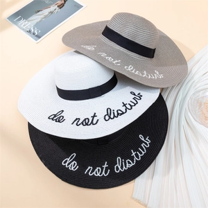 Wide brim straw sun hats with do not disturb embroidery and black ribbon bows