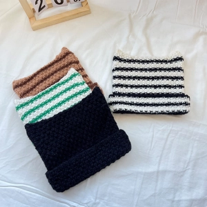 Cute knitted cat ear beanies in black, brown, and striped patterns for women's winter fashion