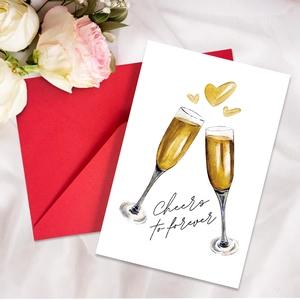 Detail of Cheers to Forever wedding card with champagne glasses and red envelope