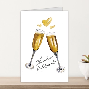 Detail of Cheers to forever wedding card with watercolor champagne glass illustration