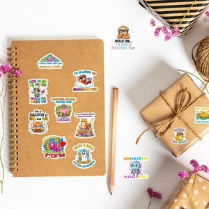 Flat lay of funny cartoon stickers with humorous English quotes on a vintage desk