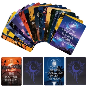 Macro view of high-quality hand-painted oracle cards with mystical moon illustrations