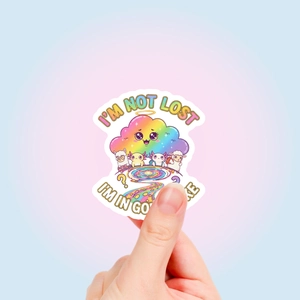 Close-up of a cute cartoon rainbow sticker featuring alpaca and sheep with matte finish
