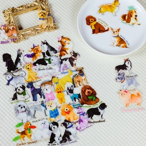 Detailed view of clear PET dog stickers featuring diverse breeds on vintage background