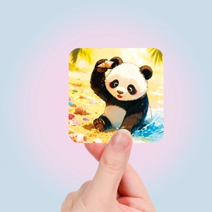 Close-up of a hand holding a cute panda cartoon sticker with a summer beach water theme