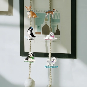 Detail of waterproof PET stickers featuring artistic illustrations of various dog breeds