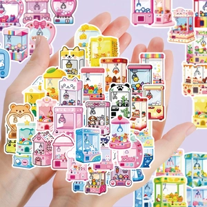 Detailed view of cute claw machine theme macaron stickers for scrapbooking decor