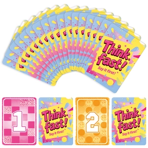 Detail showing 'Think Fast!' card deck with vibrant pop-art designs and numeric patterns