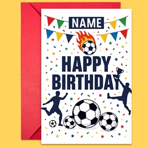 Detail of soccer themed birthday card with red envelope featuring trophy and ball motifs