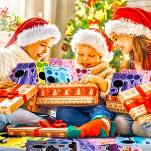 Three happy kids opening Christmas gift boxes with monster truck puzzle sticker sheets