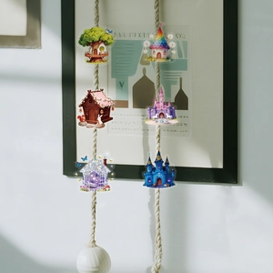 Hanging display of clear PET stickers with fairy mushroom houses and dream castles