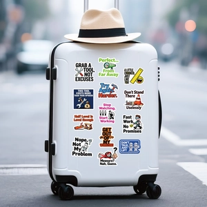 Detailed view of PVC construction tool stickers with humorous quotes on a white suitcase