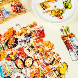 Flat lay of watercolor kitchen stickers featuring ovens and food for scrapbooking decor